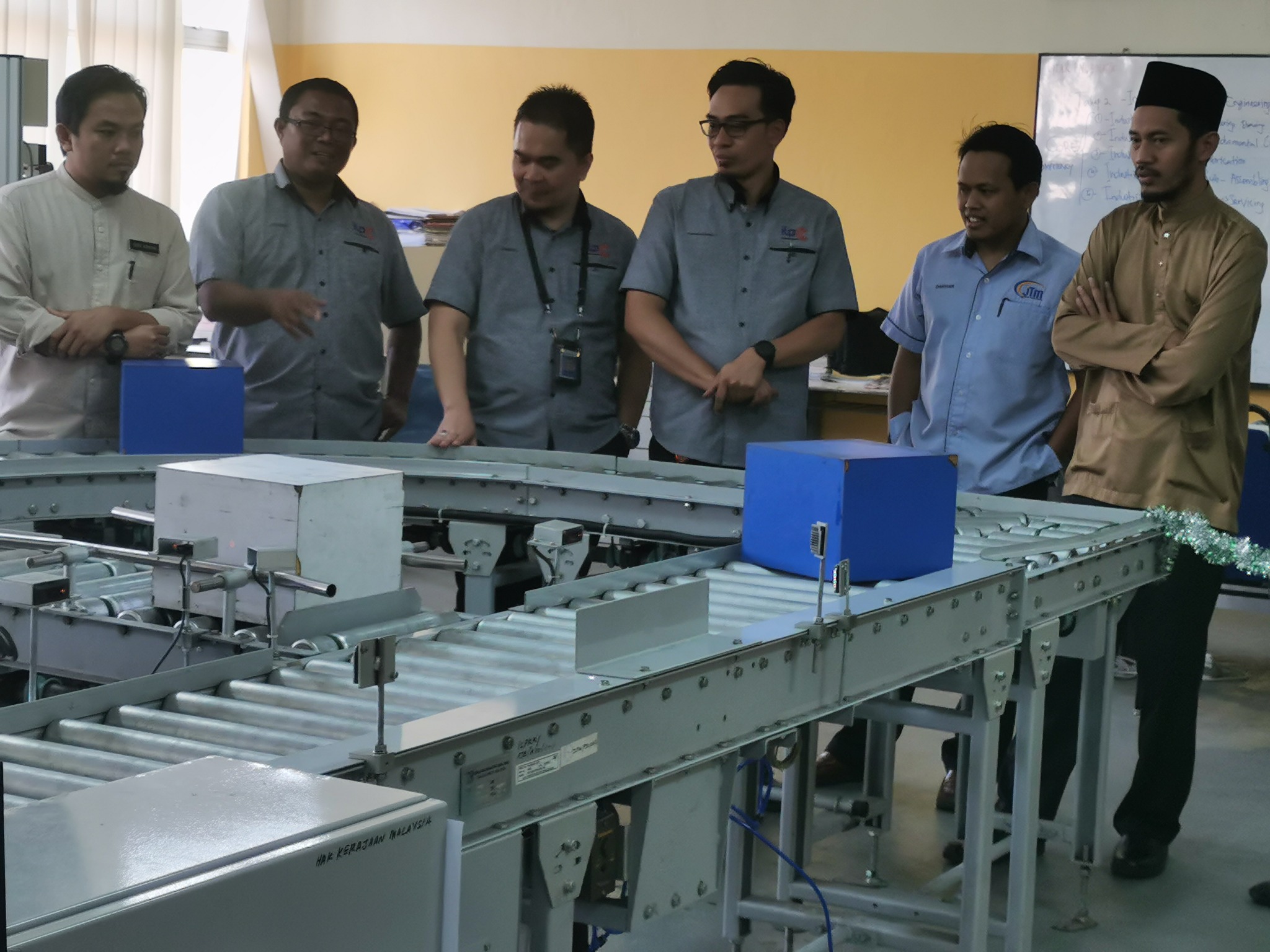 Pembaikpulihan dan Pengoperasian Semula Industrial Conveyor System di Bahagian Teknologi Mekatronik